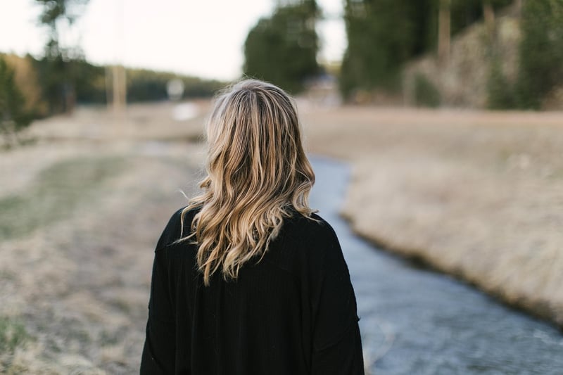 Woman walking in the forest